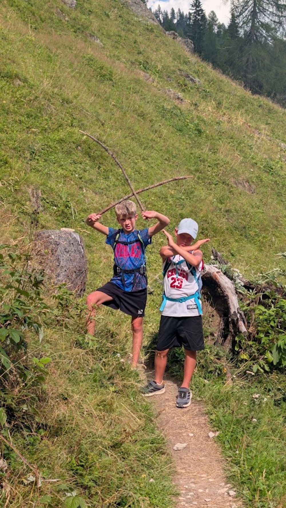 Bowen and Felix having fun together on a mountain trail
